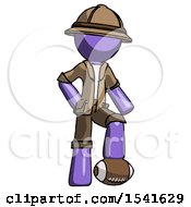 Purple Explorer Ranger Man Standing With Foot On Football