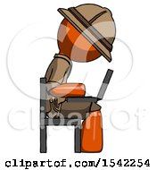 Orange Explorer Ranger Man Using Laptop Computer While Sitting In Chair View From Side