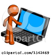 Orange Design Mascot Man Using Large Laptop Computer