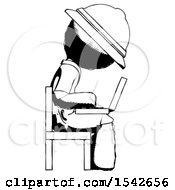 Ink Explorer Ranger Man Using Laptop Computer While Sitting In Chair View From Side