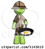 Green Explorer Ranger Man Frying Egg In Pan Or Wok