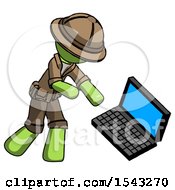 Green Explorer Ranger Man Throwing Laptop Computer In Frustration