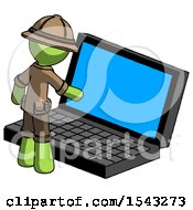 Poster, Art Print Of Green Explorer Ranger Man Using Large Laptop Computer