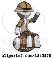 Poster, Art Print Of Gray Explorer Ranger Man Sitting On Giant Football