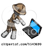 Gray Explorer Ranger Man Throwing Laptop Computer In Frustration