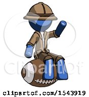 Blue Explorer Ranger Man Sitting On Giant Football