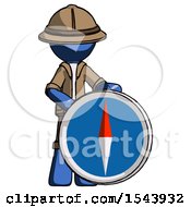 Blue Explorer Ranger Man Standing Beside Large Compass