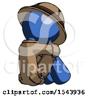 Poster, Art Print Of Blue Explorer Ranger Man Sitting With Head Down Back View Facing Right