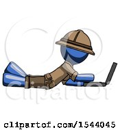Poster, Art Print Of Blue Explorer Ranger Man Using Laptop Computer While Lying On Floor Side View