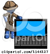 Blue Explorer Ranger Man Beside Large Laptop Computer Leaning Against It