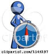 Blue Design Mascot Man Standing Beside Large Compass