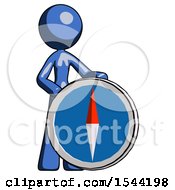 Blue Design Mascot Woman Standing Beside Large Compass