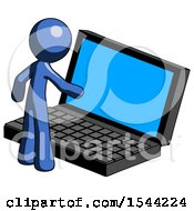 Blue Design Mascot Man Using Large Laptop Computer