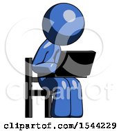 Blue Design Mascot Man Using Laptop Computer While Sitting In Chair Angled Right