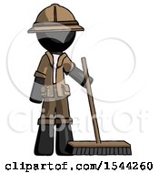 Black Explorer Ranger Man Standing With Industrial Broom