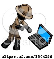 Black Explorer Ranger Man Throwing Laptop Computer In Frustration