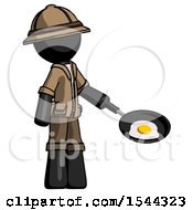 Black Explorer Ranger Man Frying Egg In Pan Or Wok Facing Right