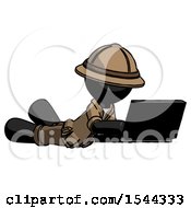 Poster, Art Print Of Black Explorer Ranger Man Using Laptop Computer While Lying On Floor Side Angled View