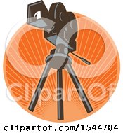 Clipart Of A Vintage 35mm Motion Picture Camera On A Tripod In A Circle Of Rays Royalty Free Vector Illustration