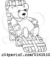 Clipart Of A Black And White Teddy Bear Relaxing On A Beach Chair Royalty Free Vector Illustration by djart