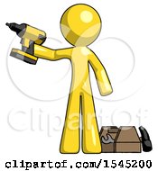 Yellow Design Mascot Man Holding Drill Ready To Work Toolchest And Tools To Right
