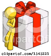 Yellow Design Mascot Woman Leaning On Gift With Red Bow Angle View
