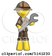 Poster, Art Print Of Yellow Explorer Ranger Man Holding Large Wrench With Both Hands