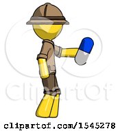 Poster, Art Print Of Yellow Explorer Ranger Man Holding Blue Pill Walking To Right