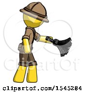 Poster, Art Print Of Yellow Explorer Ranger Man Dusting With Feather Duster Downwards