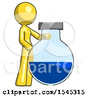 Yellow Design Mascot Woman Standing Beside Large Round Flask Or Beaker