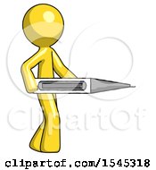 Yellow Design Mascot Man Walking With Large Thermometer