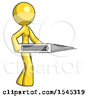 Yellow Design Mascot Woman Walking With Large Thermometer