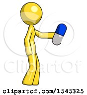 Yellow Design Mascot Woman Holding Blue Pill Walking To Right