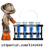 Orange Explorer Ranger Man Using Test Tubes Or Vials On Rack by Leo Blanchette