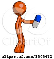 Orange Design Mascot Woman Holding Blue Pill Walking To Right