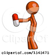Orange Design Mascot Woman Holding Red Pill Walking To Left