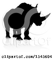 Clipart Of A Silhouetted Rhino With A Reflection Or Shadow Royalty Free Vector Illustration