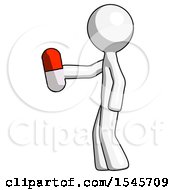 White Design Mascot Man Holding Red Pill Walking To Left