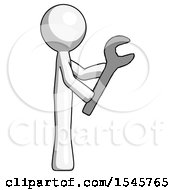 White Design Mascot Man Using Wrench Adjusting Something To Right