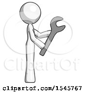 White Design Mascot Woman Using Wrench Adjusting Something To Right