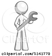 White Design Mascot Woman Holding Large Wrench With Both Hands