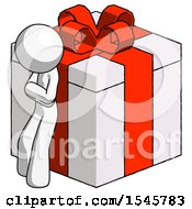 White Design Mascot Man Leaning On Gift With Red Bow Angle View