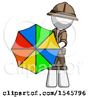 White Explorer Ranger Man Holding Rainbow Umbrella Out To Viewer