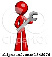 Red Design Mascot Woman Holding Large Wrench With Both Hands