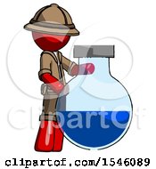 Red Explorer Ranger Man Standing Beside Large Round Flask Or Beaker