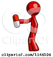 Red Design Mascot Man Holding Red Pill Walking To Left