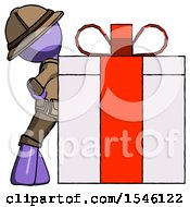 Purple Explorer Ranger Man Gift Concept Leaning Against Large Present
