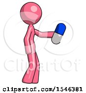 Pink Design Mascot Woman Holding Blue Pill Walking To Right