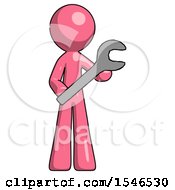 Pink Design Mascot Man Holding Large Wrench With Both Hands
