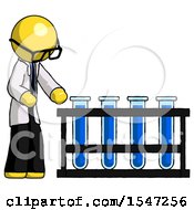 Yellow Doctor Scientist Man Using Test Tubes Or Vials On Rack